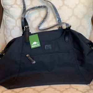 Brand new Roots over the shoulder black fabric bag